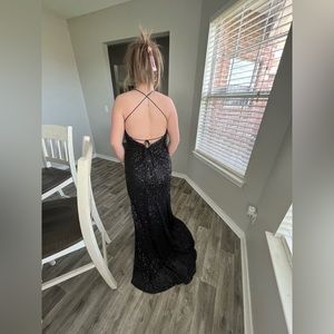 This is a prom dress, size medium in the color black!